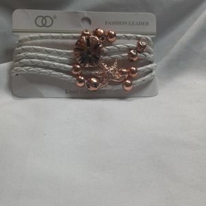 Fashion Leader white and Cooper bracelet with charms